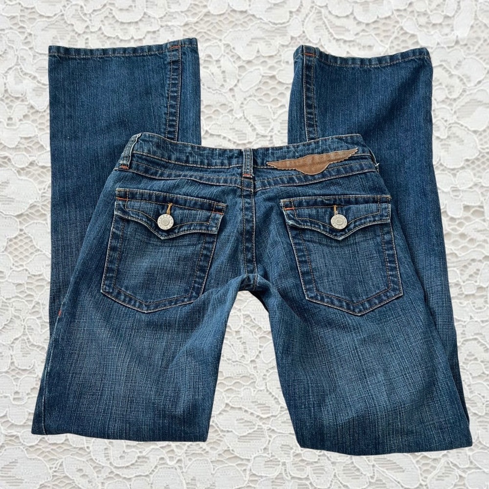vintage bcbg low rise bootcut jeans with cute wing leather patch & butt pockets